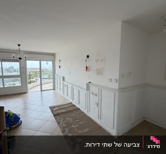 הכנת קירות בסלון דירה ריקה לצביעה וביצוע תיקוני שפכטל